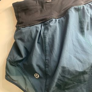 green LULULEMON shorts.